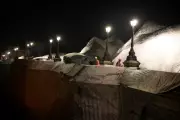 French Artist JR Inflates Giant 'Cave' Over Paris' Oldest Bridge