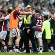 Hearts Bolt Celtic Park After Pitch Invasion and Assault Allegations