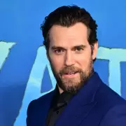 Henry Cavill's Joyful Reaction to Warhammer Gift on Highlander Set Delights Fans