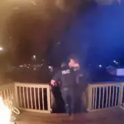 Hero Police Officer Runs Into Burning Building to Rescue Family