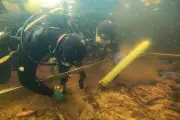 Hidden Wooden Platform Found Under Neolithic Artificial Island in Scottish Loch