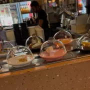 I visited world's first cheese conveyor belt restaurant – here's what it was like