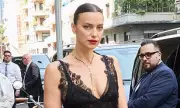 Irina Shayk Stuns in Sheer Lace Gown Outside Palazzo Parigi in Milan