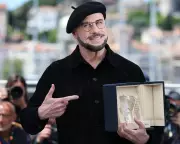 John Travolta's Beret at Cannes: Dressing for the Director Role