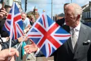 King Gets Seagull Splatter, Queen Pints Guinness on Ulster Visit