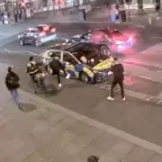 Man fined for eating takeaway on police car bonnet in London