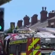 Man on Roof Throws Objects, Sets Fires in Chorley Standoff