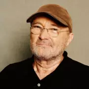 Phil Collins Joins Sir Rod Stewart at Buckingham Palace in Rare Appearance