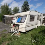 Retired Police Officer's Garden Blighted by Abandoned Caravan for Two Years