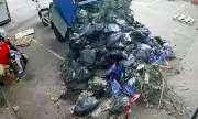 Shocking moment truck dumps waste outside shop in England's fly-tipping capital