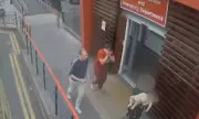 Teacher accused of murdering baby boy captured on CCTV rushing him to hospital