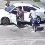 Texas dad shoots dead suspected carjacker to protect children in car park