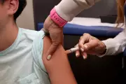 Trump Order Seeks to Halve Recommended Childhood Vaccines, Sparking Health Concerns