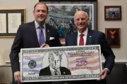 Trump's 'Favorite British Artist' Designs $250 Bill Featuring His Mugshot