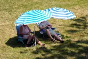 UK Heatwave Eases: Met Office Forecasts Cooler Temps and Showers