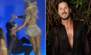 Val Chmerkovskiy and Emma Slater Slip and Fall During SI Runway Show