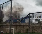 Venezuela inmates set prison roof on fire to protest alleged abuses