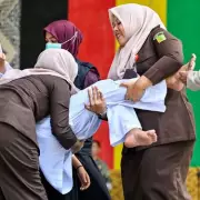 Woman Faints After 100 Lashes for Sex Outside Marriage in Indonesia