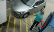 Woman Keyed Car with Air Hose at Sydney Petrol Station on CCTV
