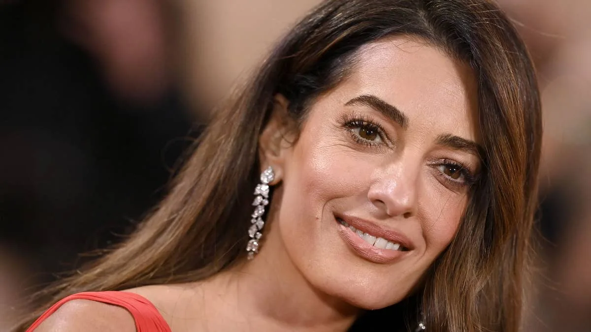 Amal Clooney Turns Heads in Versace Leopard Boots During Milan Outing