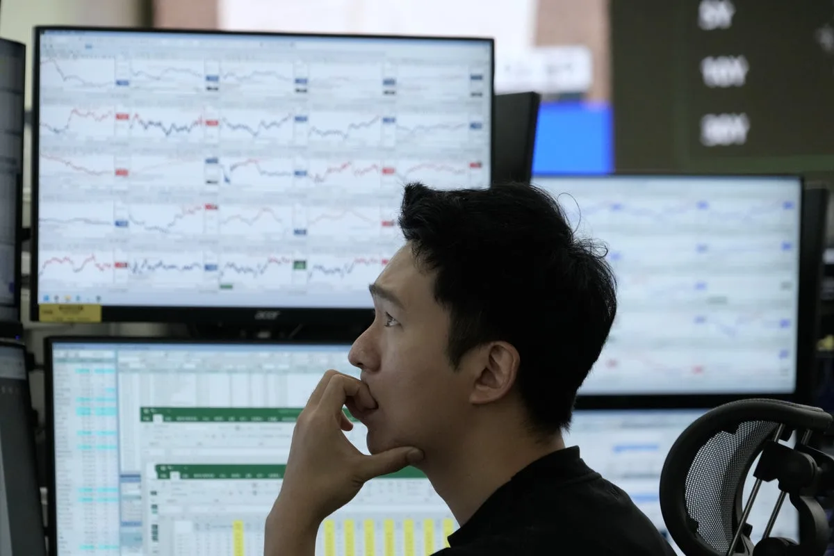 Asian Shares Fall on AI Stock Sell-Off and Interest Rate Fears