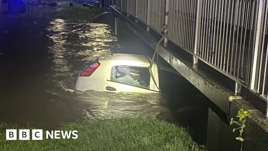 Birmingham Floods: Man Smashes Car Window to Rescue Mother and Child