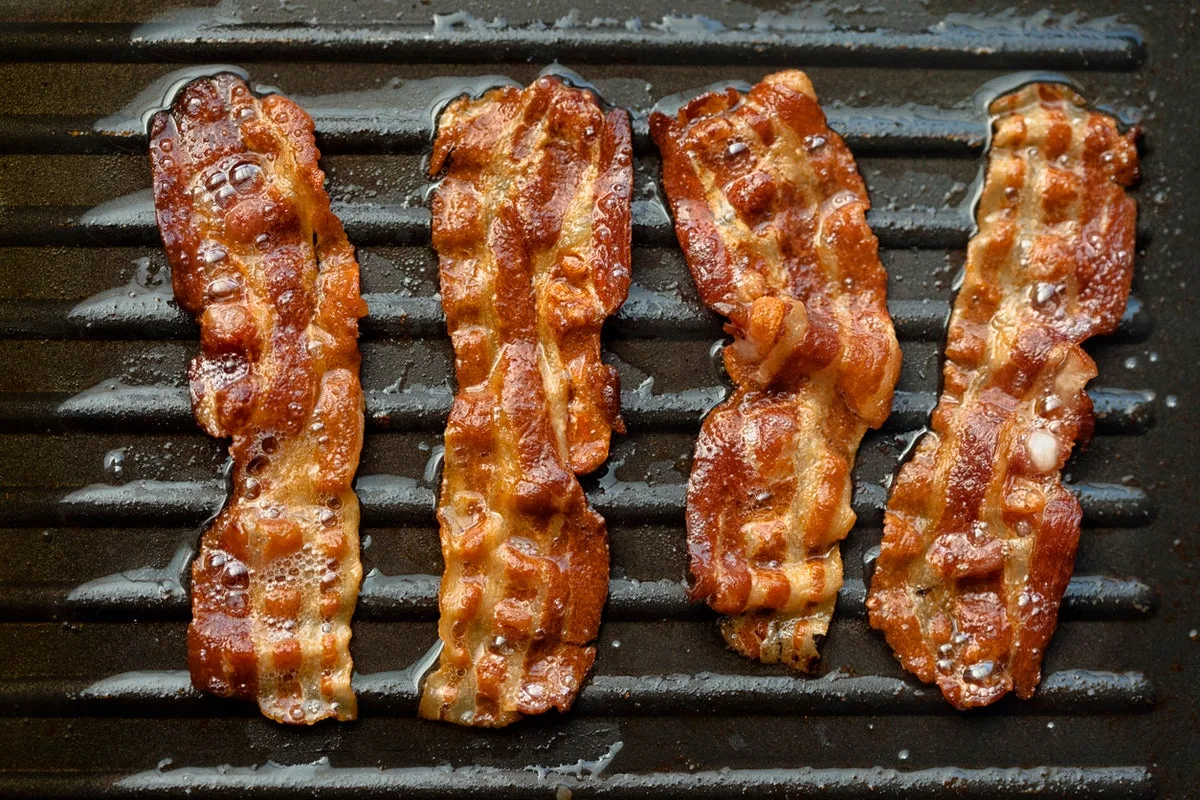 Bacon's Health Paradox: Ultra-Processed Warning vs Traditional Curing