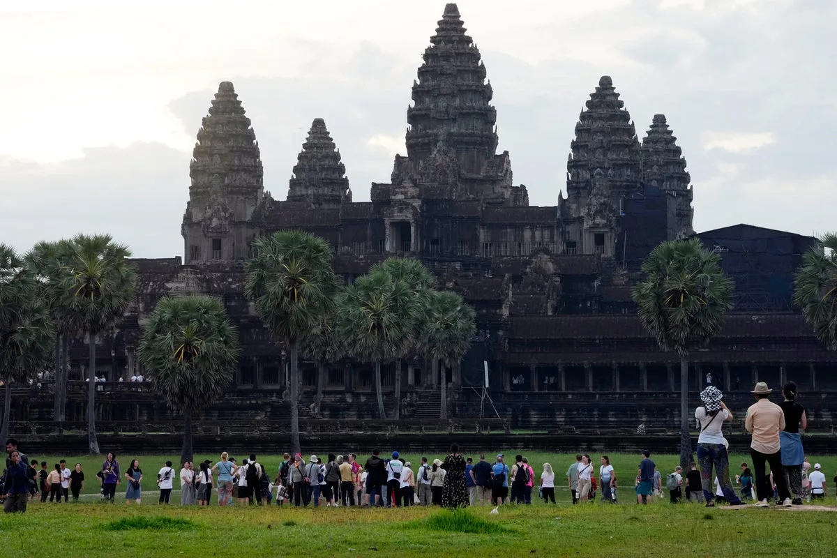 Bus crash in Cambodia kills 13, injures two dozen