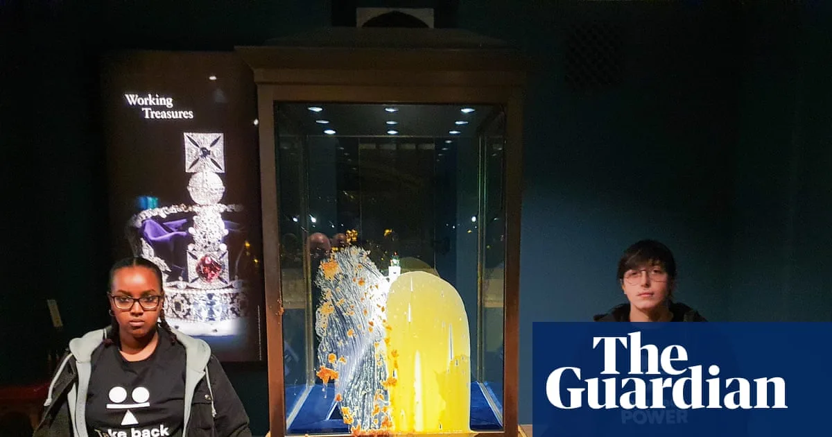 Apple Crumble Thrown at Crown Jewels in Inequality Protest