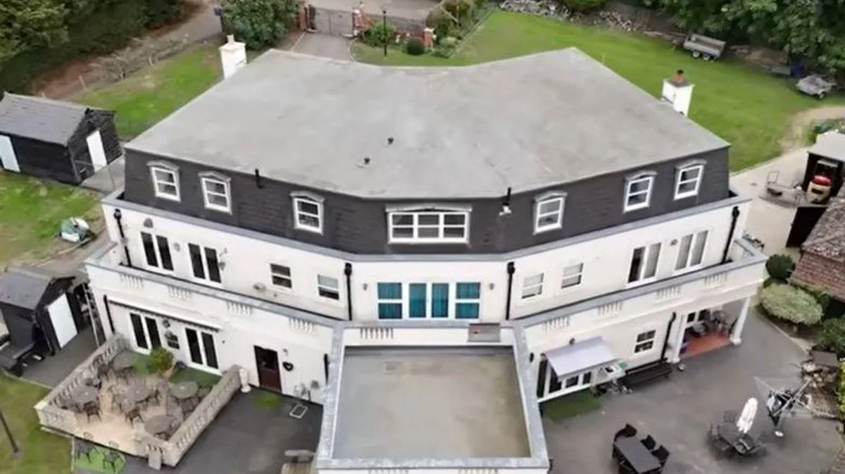 Darts Legend Bobby George Lives in Dart-Shaped Mansion with Three Fishing Lakes
