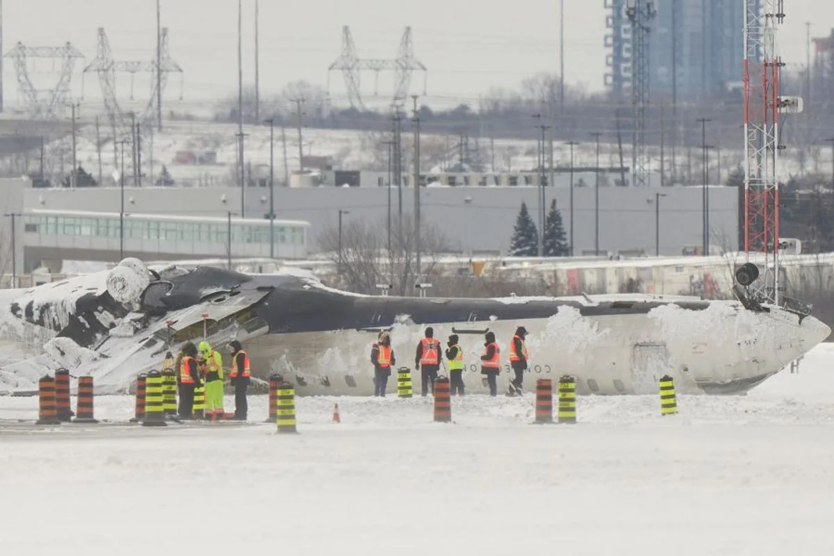 Delta Flight Attendant Sues Airline Over Toronto Crash, Citing Inexperienced Pilot