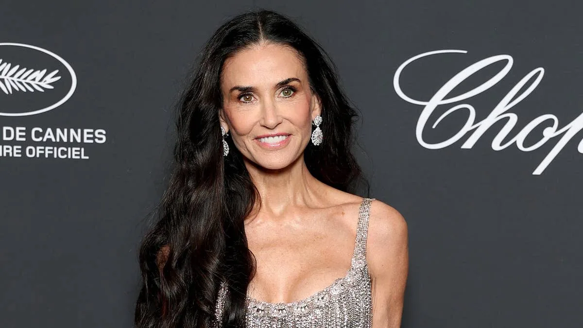 Demi Moore Stuns in Plunging Silver Gown at Cannes 2025