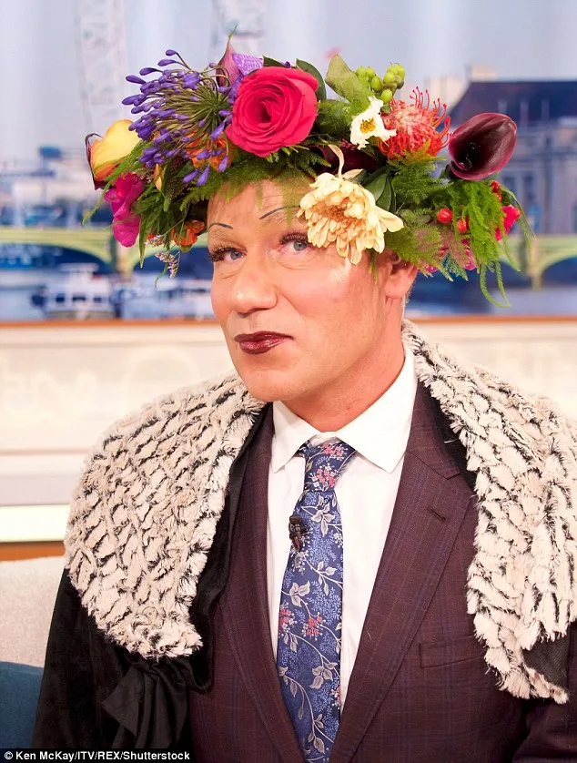 GMB's Richard Arnold Channels Rihanna in Floral Headpiece and Bold Makeup