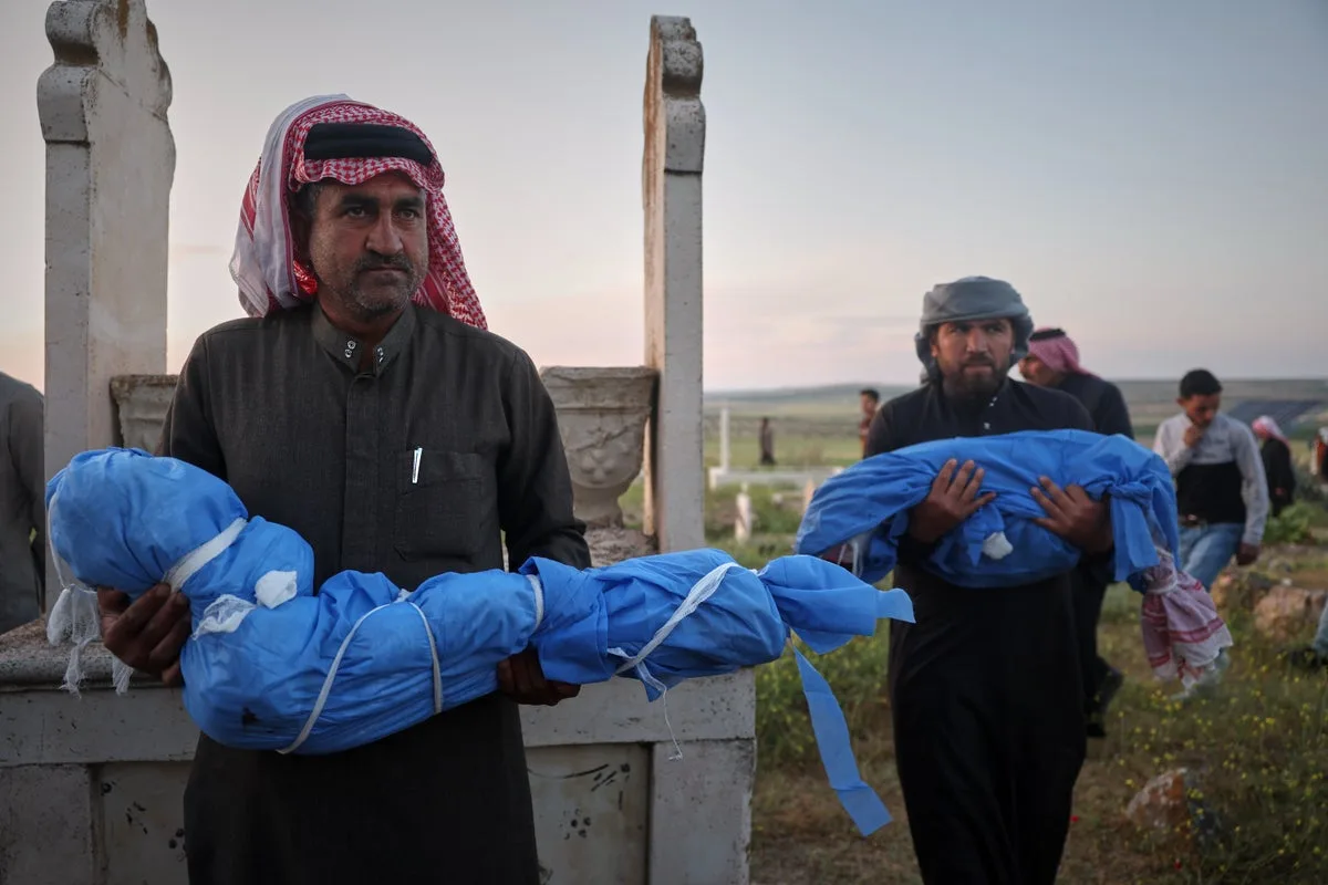 Grieving Father Buries Son After Landmine Kills Three Children in Syria