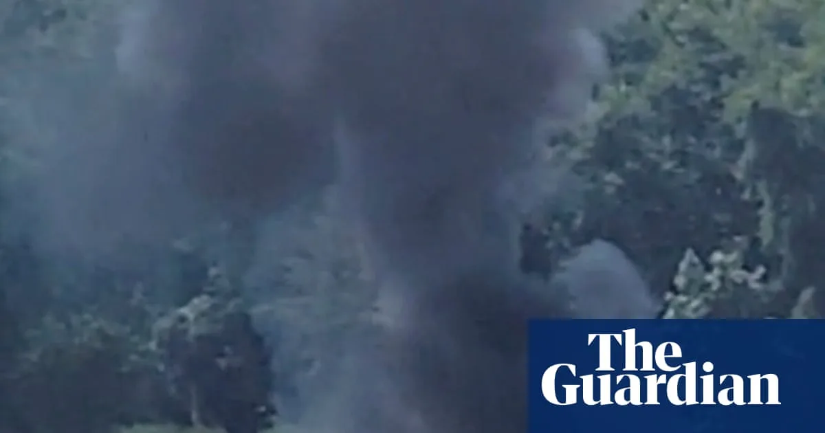 Two dead after helicopter crashes into barge on Mississippi River