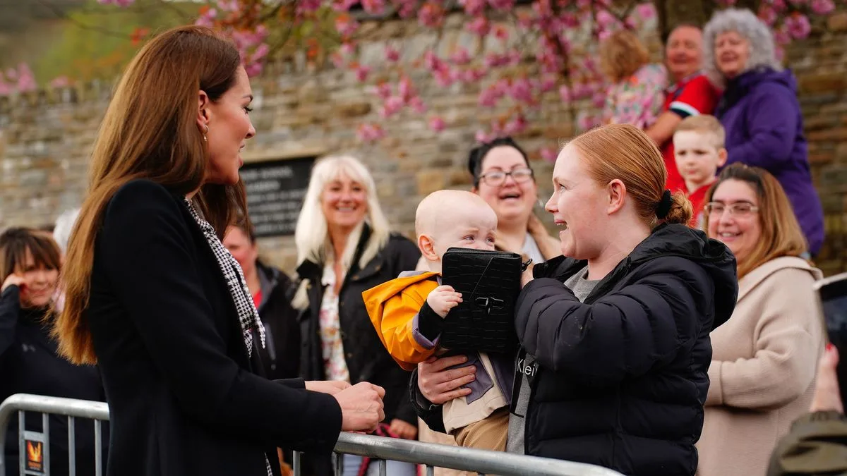 Kate Middleton's Handbag Snatched by Baby During Aberfan Visit