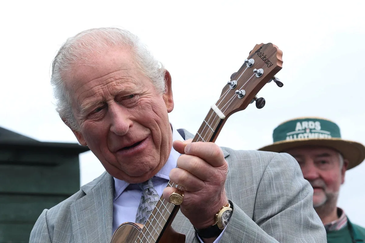 King Charles strums ukulele during Northern Ireland visit