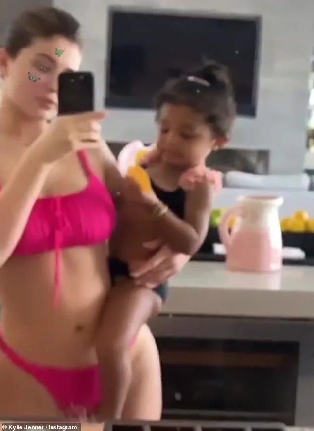 Kylie Jenner Shows Off Hot Pink Bikini During Family Pool Day with Travis Scott and Stormi