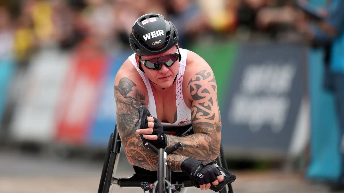 Weir's Wheelchair Marathon Heartbreak as Puncture Hands Gold to Smith