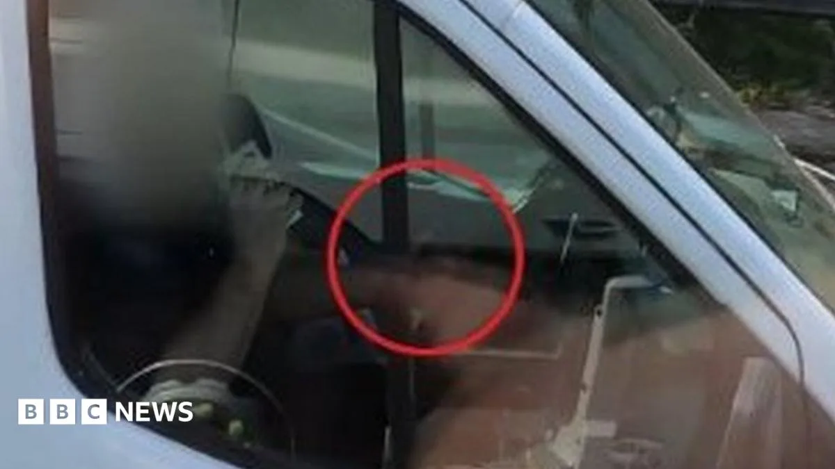 M6 crackdown: Lorry driver caught on film rolling cigarette at wheel