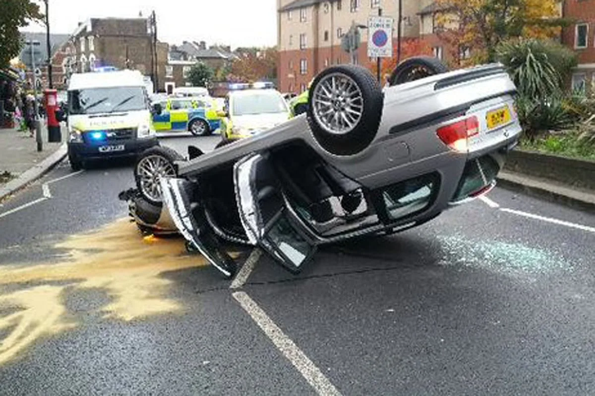 Father and Two Children Escape Serious Injury After Car Overturns in Harlesden