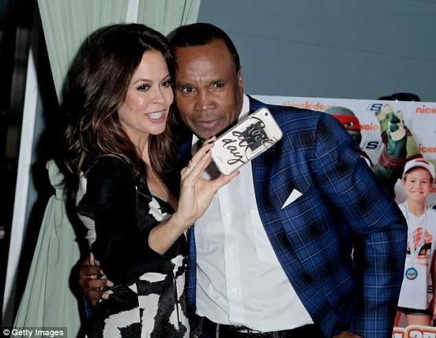 Sugar Ray Leonard and Brooke Burke Share Laughter at Charity Selfie Fail