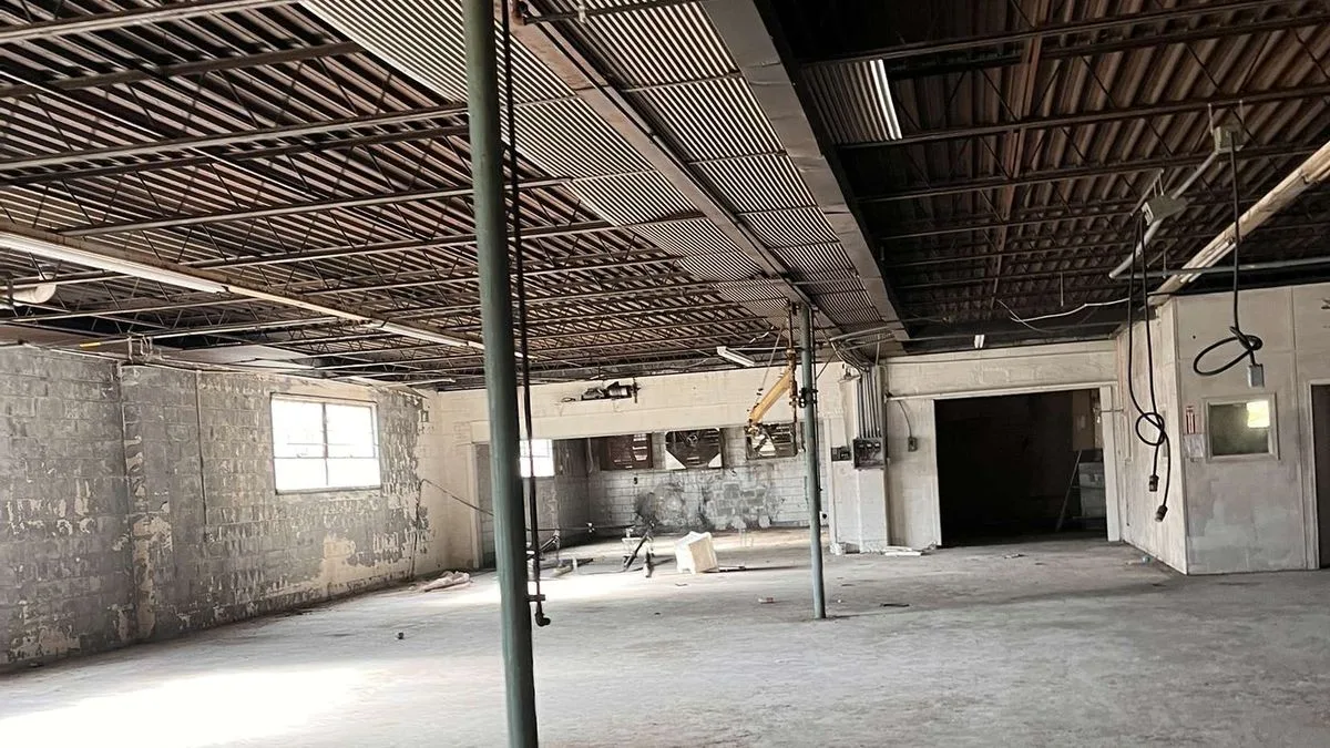 Teenager Discovers Abandoned Warehouse Full of Energy Drinks and NASCAR Cars on Google Earth