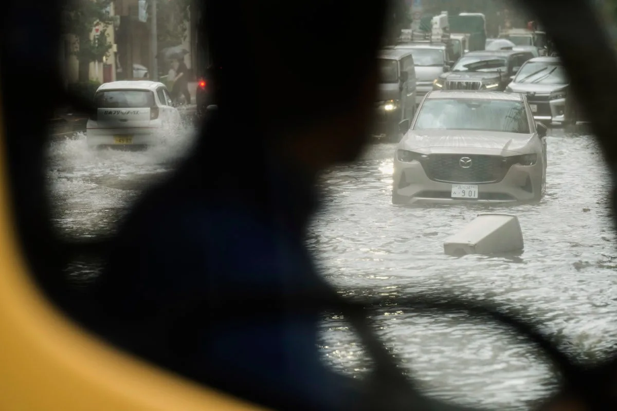 Tokyo Paralyzed by Sudden Torrential Rain and Flooding