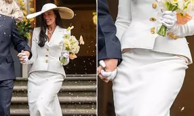 Dua Lipa's Wedding Outfit Distracts Fans with Visible Hip Padding