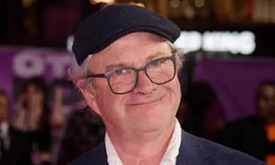 Harry Enfield Diagnosed with Surfer's Ear from Cold-Water Swimming