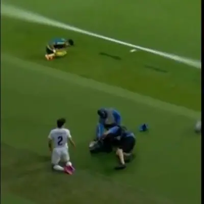 Medics Rush to Injured Cameraman After Collision With Man City Star at World Cup