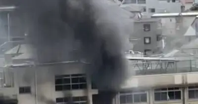 Tokyo School Fire: Children Cling to Window Ledge in Harrowing Escape