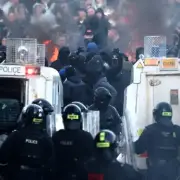 12 officers hurt, 16 arrested in second night of NI unrest