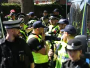 24 Deny Obstructing Police in Crewe Religious Group Raids